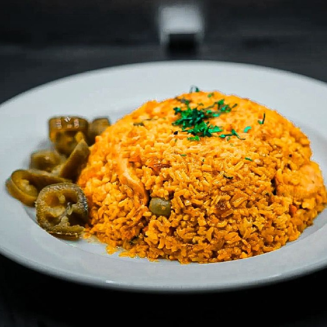 Arroz con Pollo.